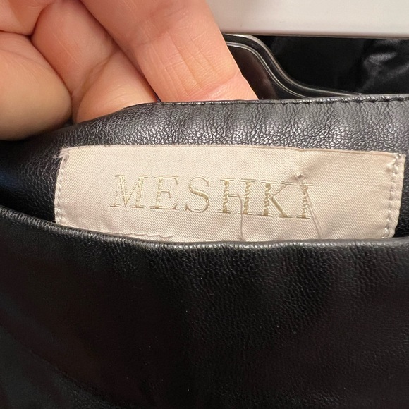 33. MESHKI Black Shayla Skinny Faux Leather Split Pant - Picture 7 of 16